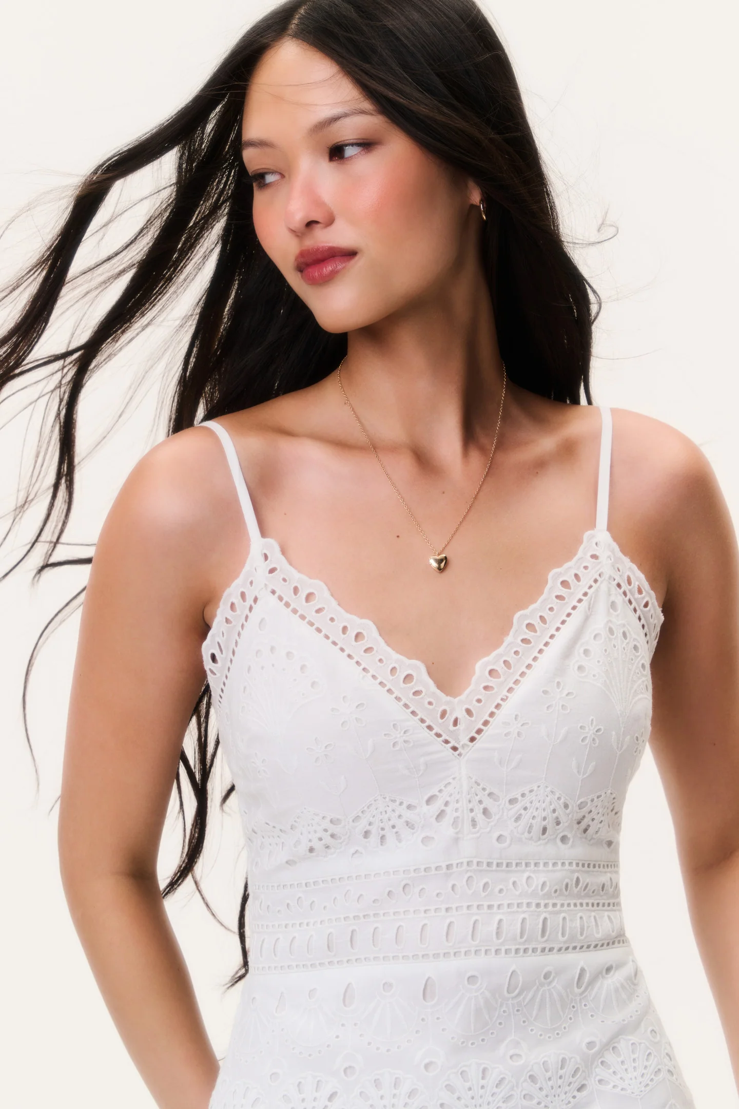 Vestido mini de algodón con ojales animado