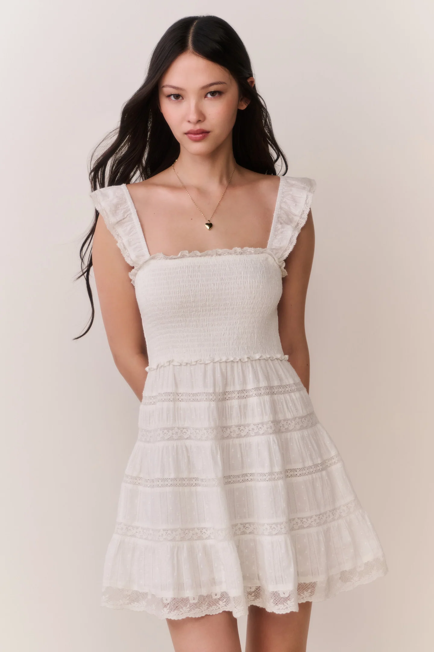 Vestido corto de algodón con volantes de encaje Colbera