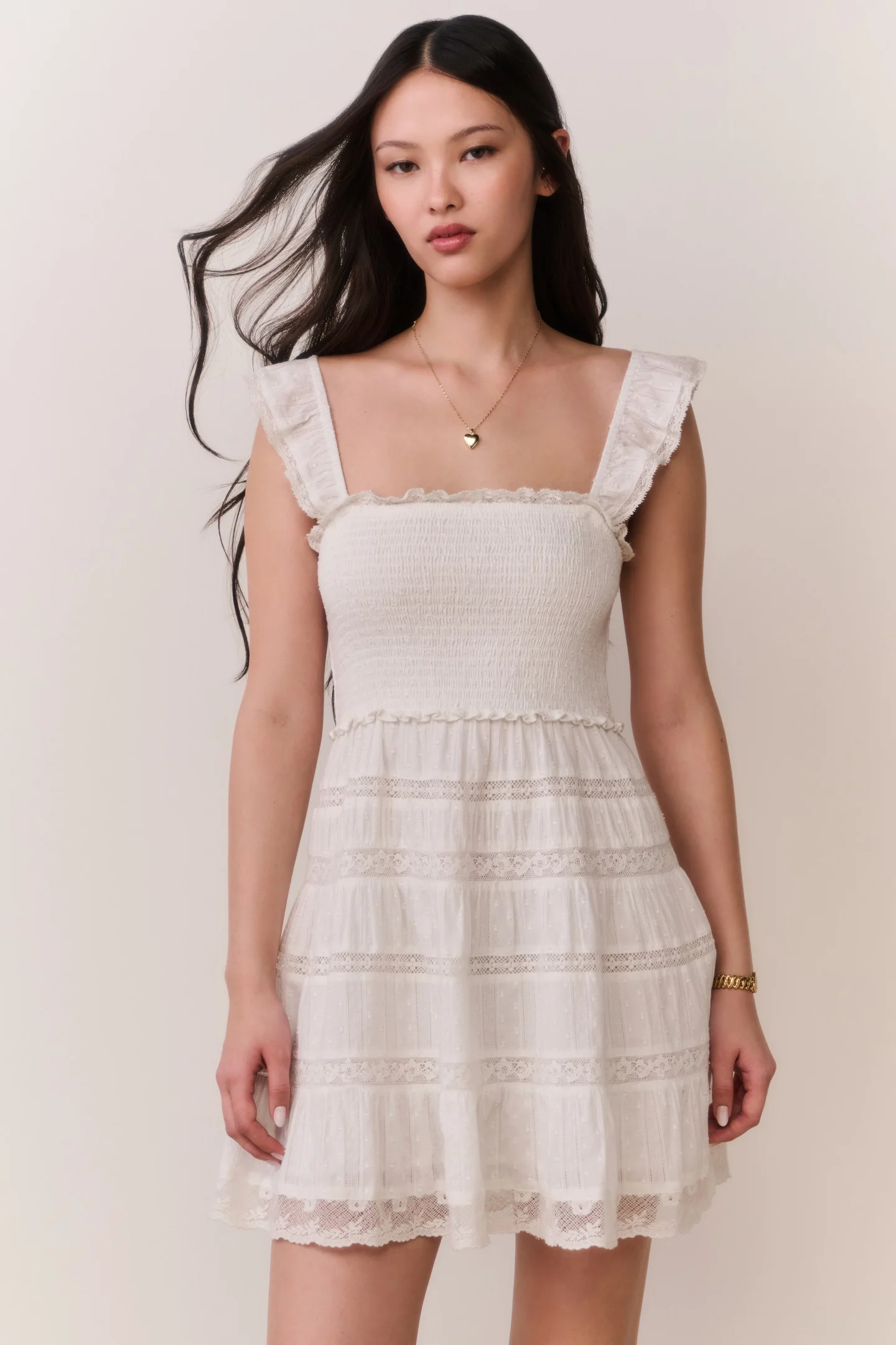 Vestido corto de algodón con volantes de encaje Colbera