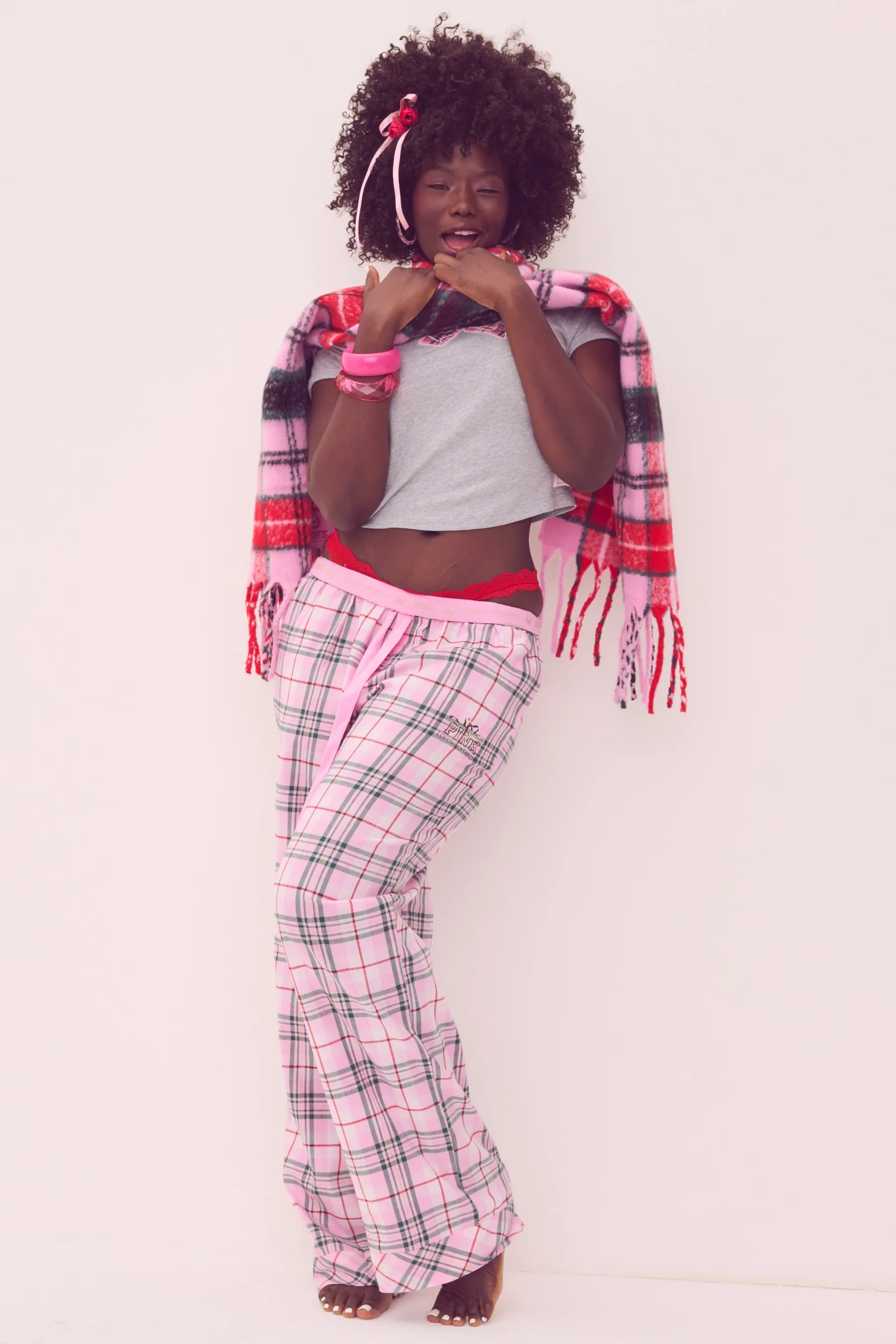 PANTALONES DE PANTUFLA DE LANA CON ESTRIAS DE LUREX ROSA x LOVESHACKFANCY